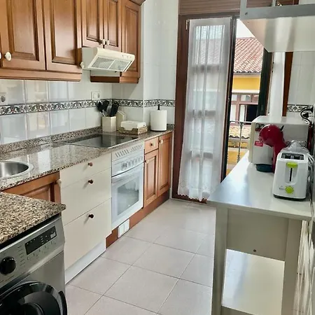 Апартаменти Apartamento Cimadevilla